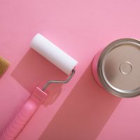 assortment-painting-items-with-pink-paint_23-2149579953